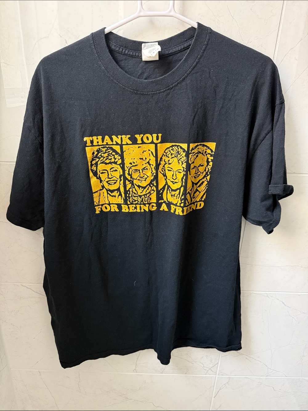 Black Graphic Tee with Yellow 'Thank You For Being A Friend' Print